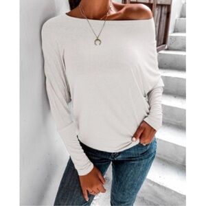 White cold shoulder dolman sleeve top